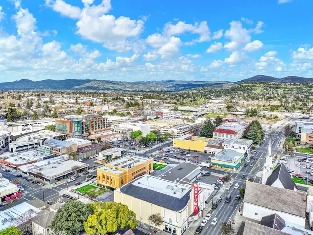 a front view of a house with yard
