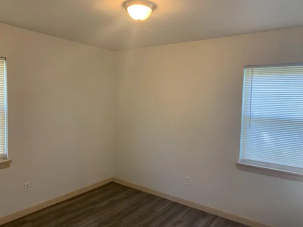 a view of a room that has a window