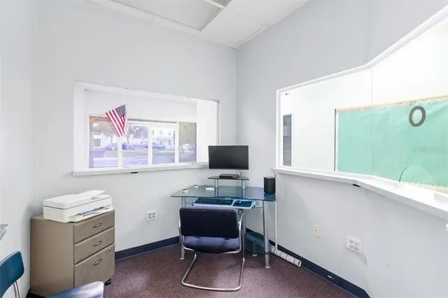 a workspace with furniture and a table