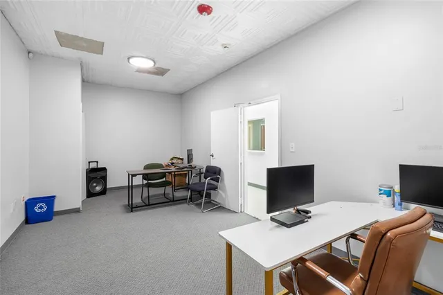 a bathroom with a sink a mirror and a shower