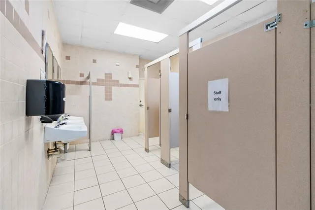 a bathroom with a sink and a toilet