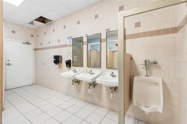 a room with gym equipment and a window