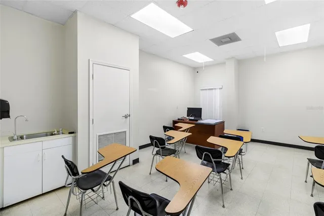 a bathroom with a toilet and a sink