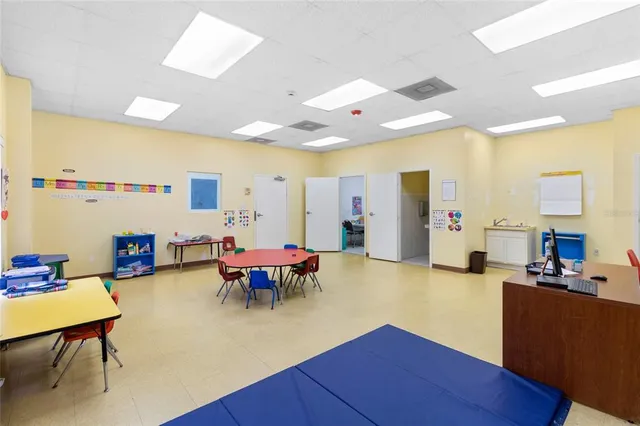 a view of a livingroom with furniture and windows