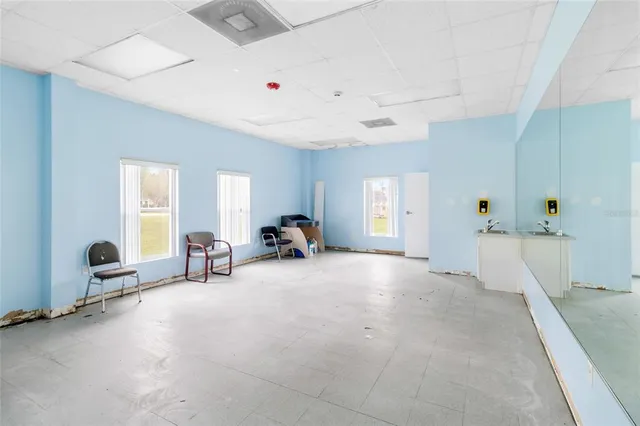 a view of an empty room with a window