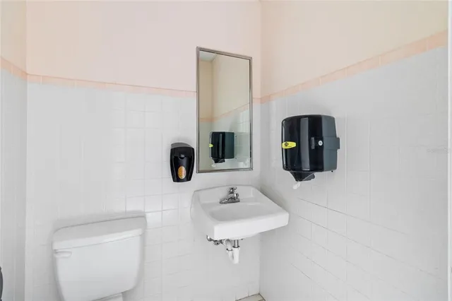 a view of a wooden door and a bench