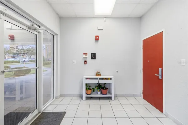 a workspace with furniture and window