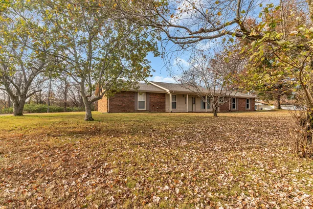 front view of house with a yard