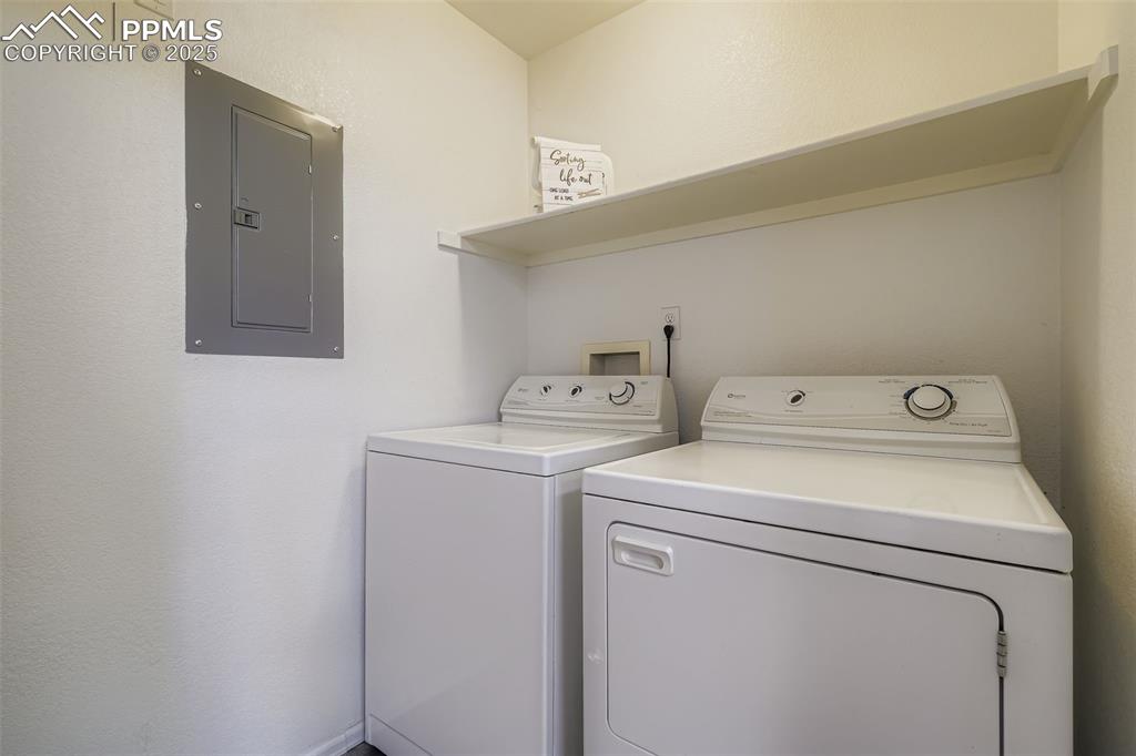 283 Ellers Grove Colorado Springs, CO 80916 - Photo 15 of 17 a utility room with dryer and washer