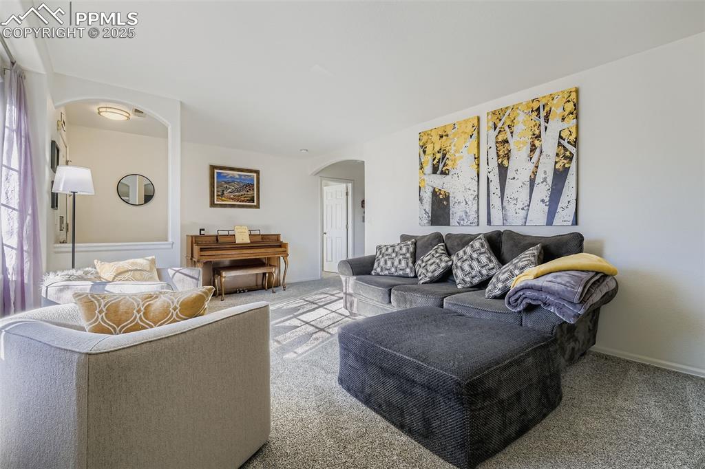 283 Ellers Grove Colorado Springs, CO 80916 - Photo 5 of 17 a living room with furniture