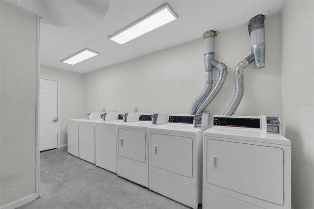 a view of a room with dryer and washer