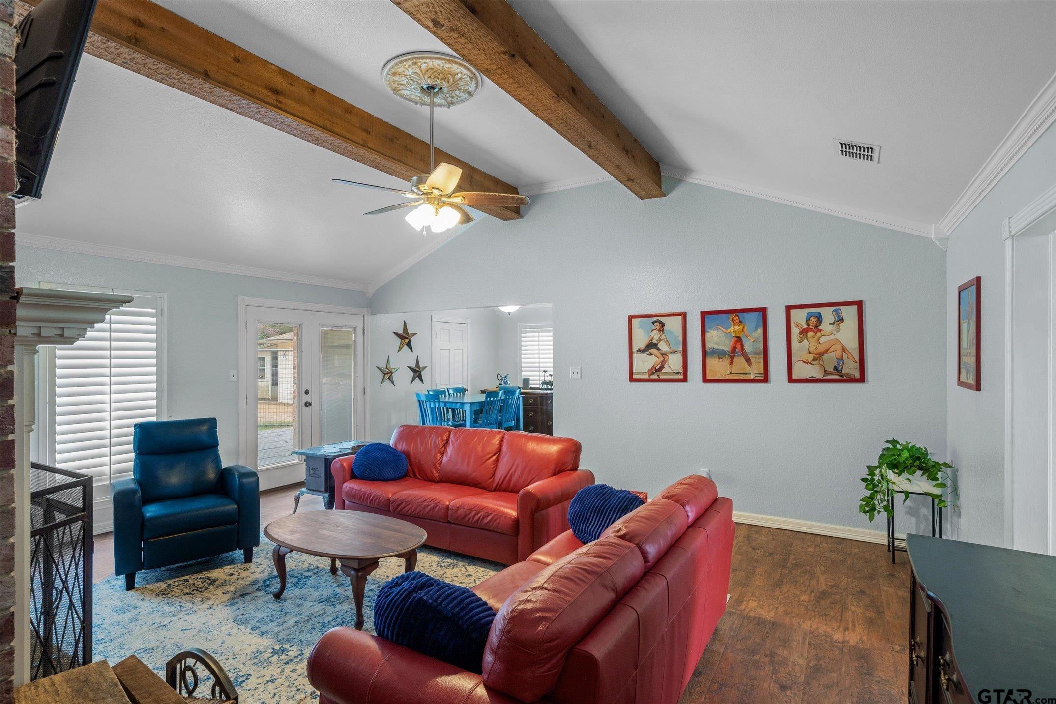 1936 Silver Maple Road Big Sandy, TX 75755 - Photo 12 of 48 a living room with furniture a couch and a ceiling fan