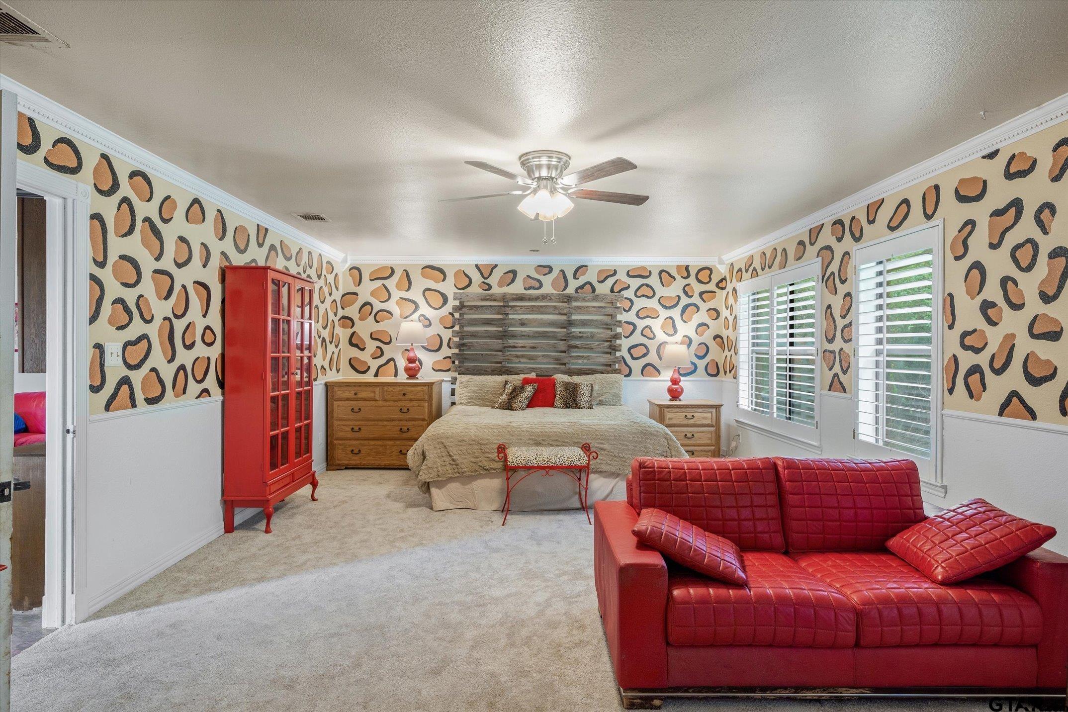 1936 Silver Maple Road Big Sandy, TX 75755 - Photo 17 of 48 a living room with patio furniture and a chandelier