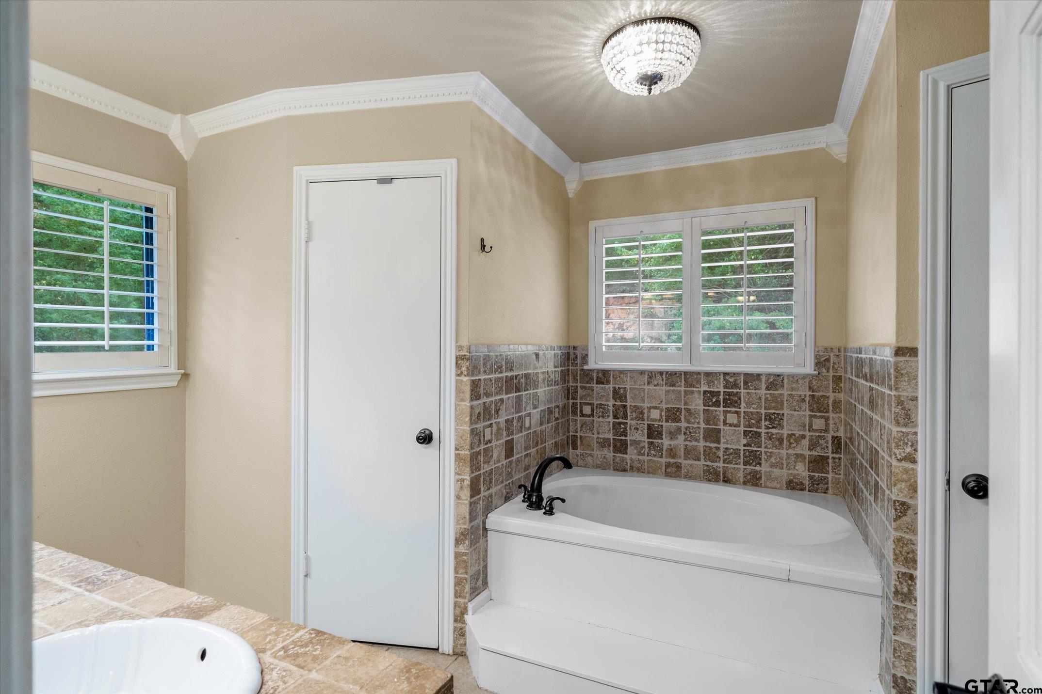 1936 Silver Maple Road Big Sandy, TX 75755 - Photo 20 of 48 a bathroom with a bathtub and a shower
