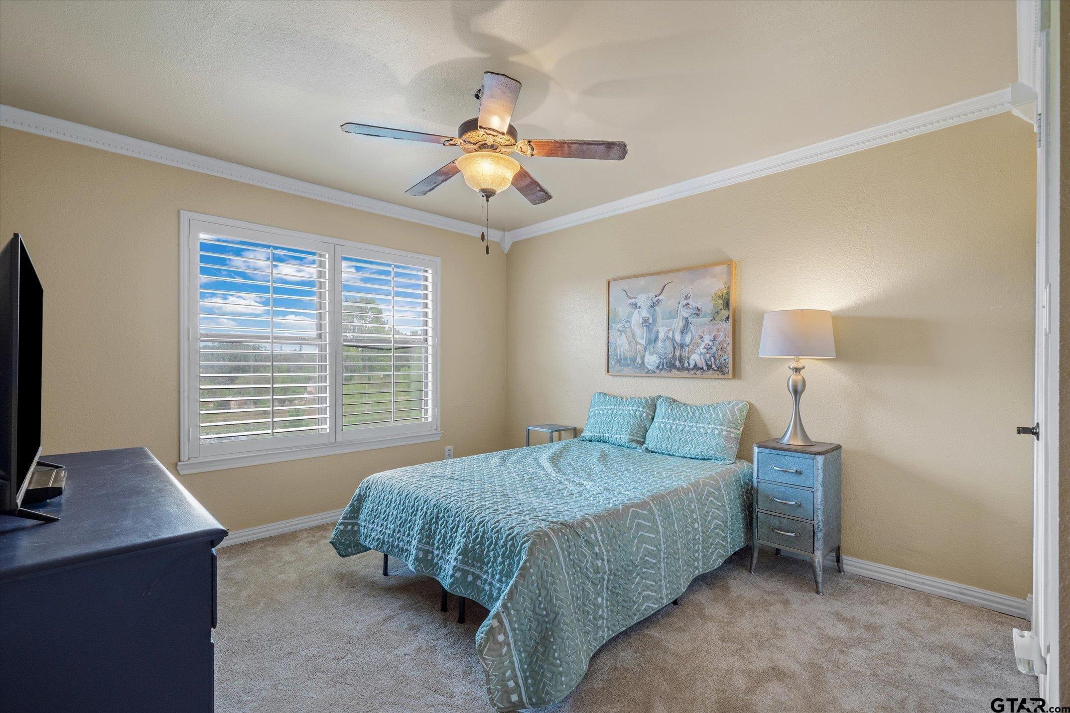 1936 Silver Maple Road Big Sandy, TX 75755 - Photo 24 of 48 a bedroom with a bed and a desk