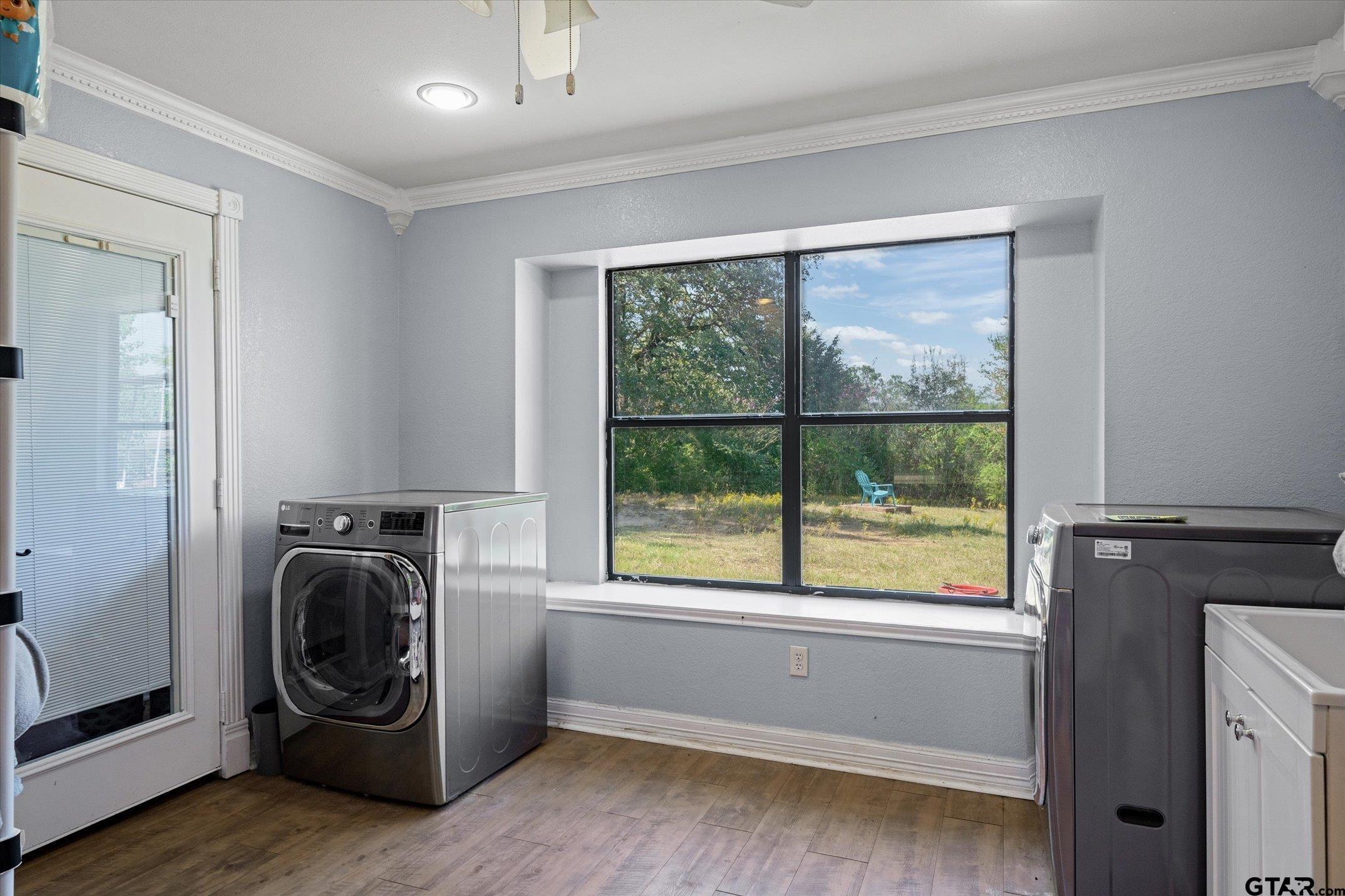 1936 Silver Maple Road Big Sandy, TX 75755 - Photo 30 of 48 a utility room with dryer and washer