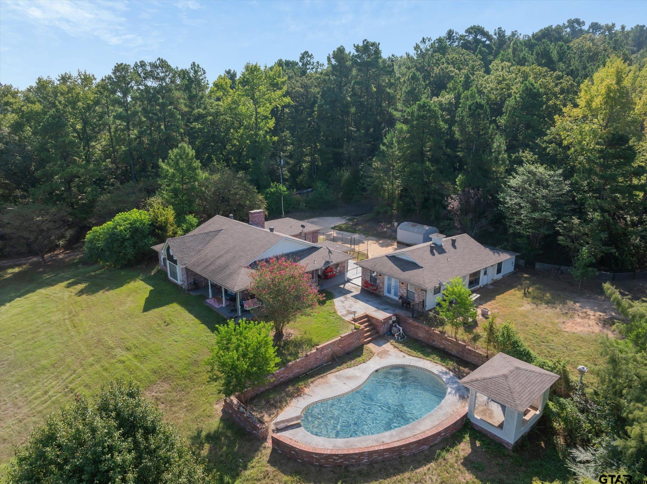 1936 Silver Maple Road Big Sandy, TX 75755 - Photo 3 of 48 an aerial view of a house with yard swimming pool and outdoor seating