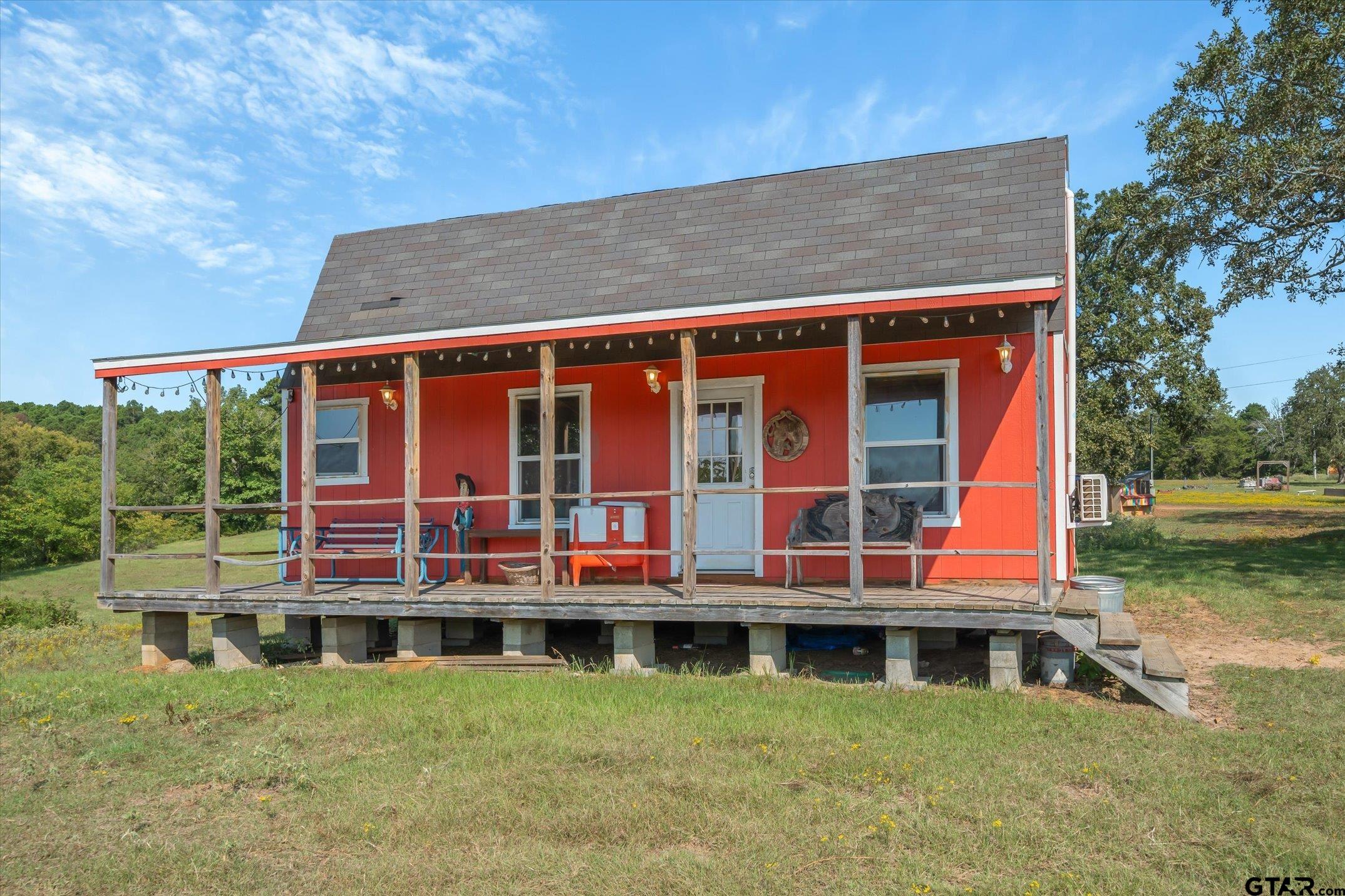 1936 Silver Maple Road Big Sandy, TX 75755 - Photo 36 of 48 a front view of a house with a yard