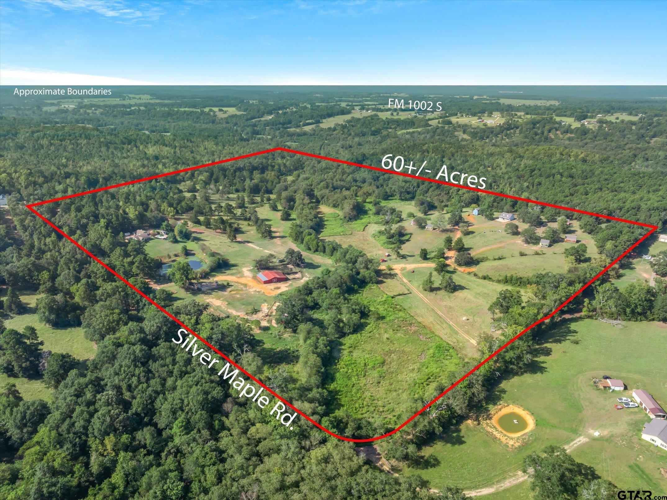 1936 Silver Maple Road Big Sandy, TX 75755 - Photo 7 of 48 an aerial view of ocean and houses with outdoor space