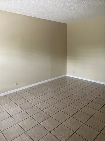 a view of a room and window