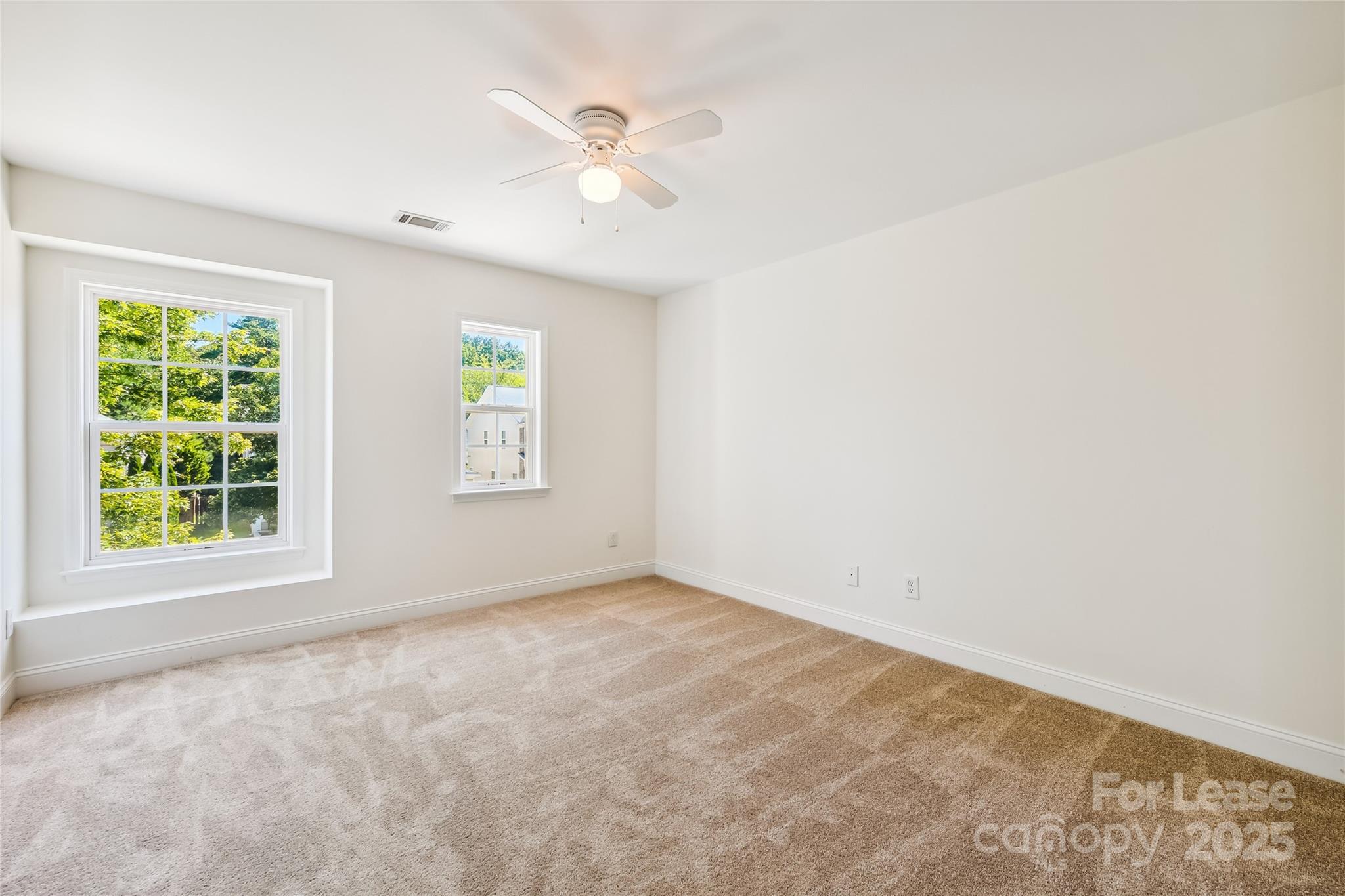 15614 Normans Landing Drive Charlotte, NC 28273 - Photo 19 of 21 an empty room with windows