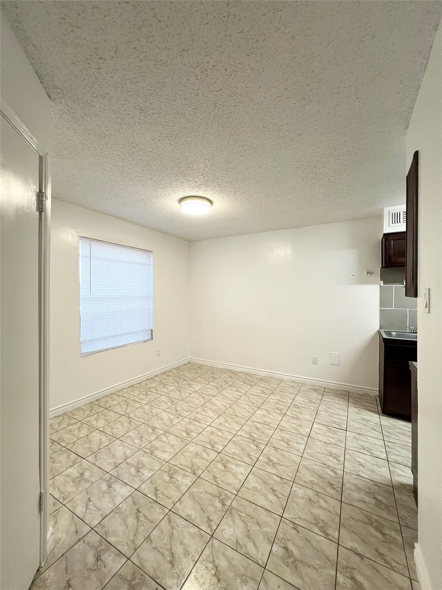12710 Leader Street, Unit B Houston, TX 77072 - Photo 7 of 9 a view of an empty room