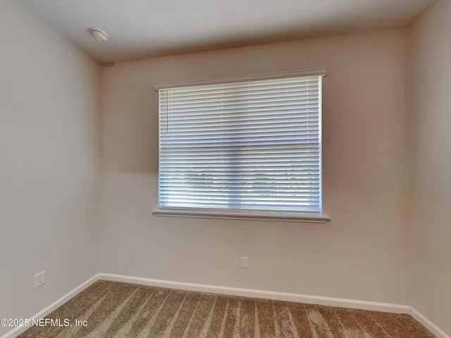 a view of a small space with a window