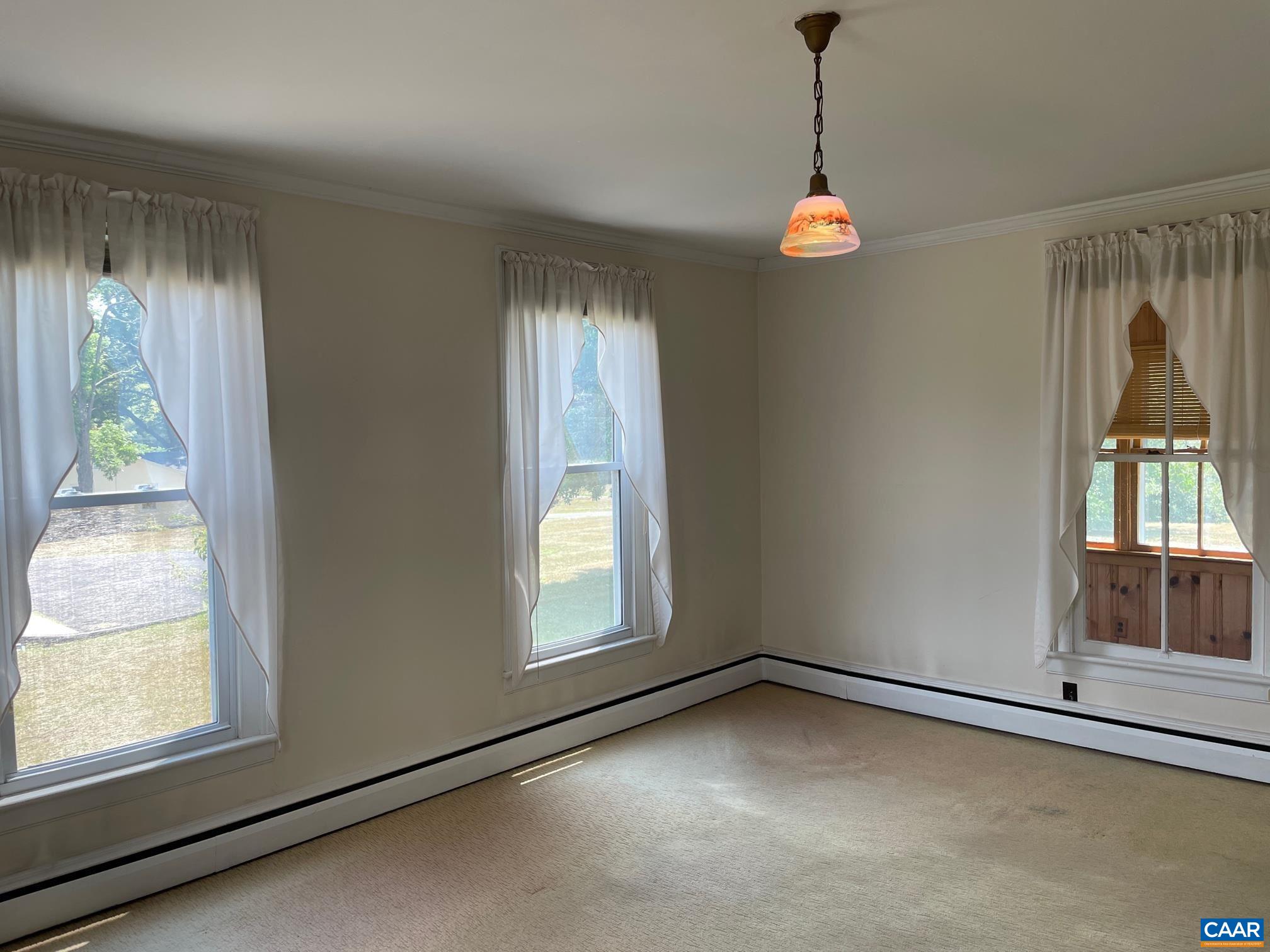 772 Poplar Spring Road Scottsville, VA 24590 - Photo 20 of 74 a view of an empty room with a window