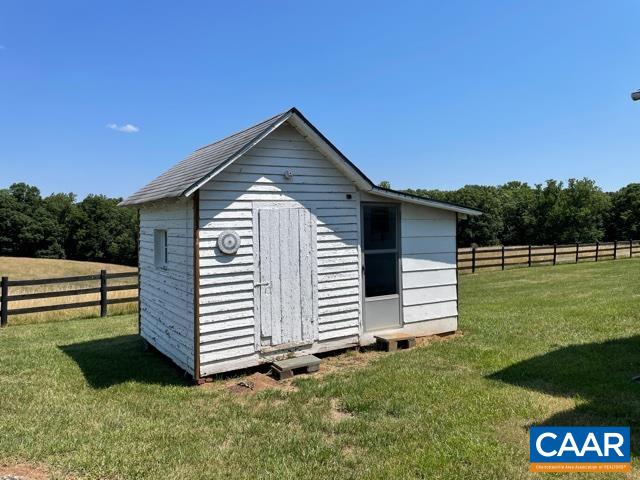 772 Poplar Spring Road Scottsville, VA 24590 - Photo 52 of 74 a front view of a house with a yard