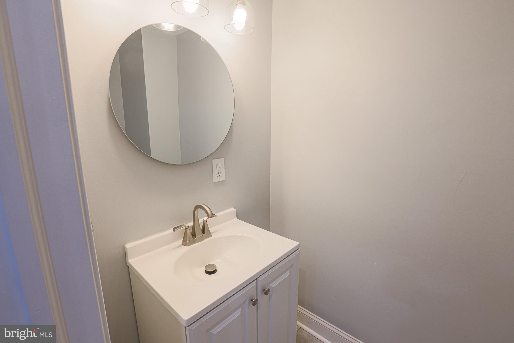 4622 Belair Road Baltimore, MD 21206 - Photo 10 of 36 1st floor half bathroom