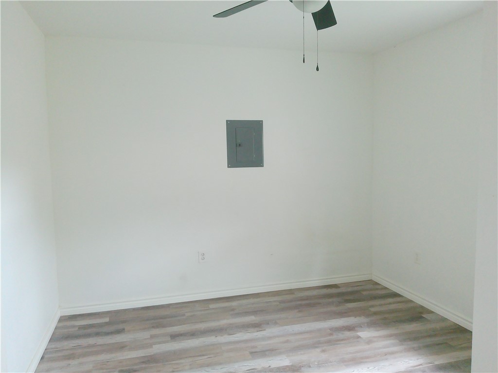 4117 Monaco Street Corpus Christi, TX 78411 - Photo 9 of 17 a view of a room with wooden floor