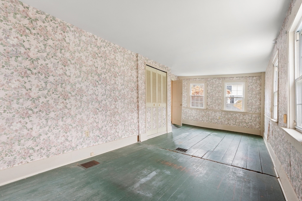 359 Kenoza Street Haverhill, MA 01830 - Photo 13 of 37 an empty room with windows