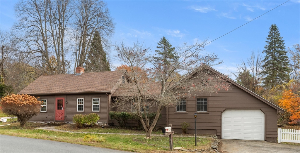359 Kenoza Street Haverhill, MA 01830 - Photo 2 of 37 a front view of a house with garden