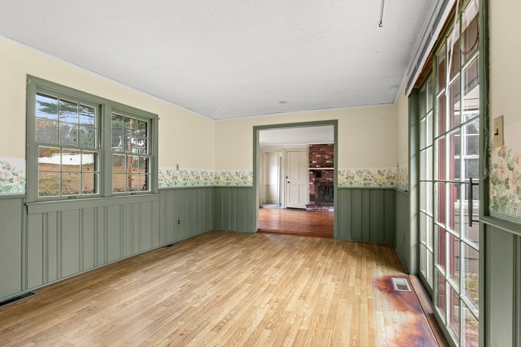 359 Kenoza Street Haverhill, MA 01830 - Photo 26 of 37 a view of a kitchen with furniture and a window