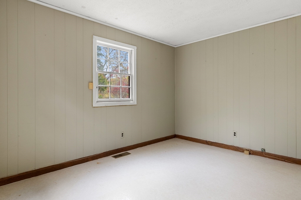 359 Kenoza Street Haverhill, MA 01830 - Photo 27 of 37 a view of an empty room with a window