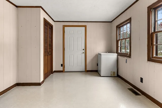 an empty room with windows