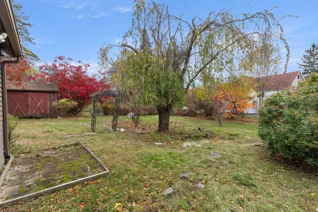 a view of a yard in front of house