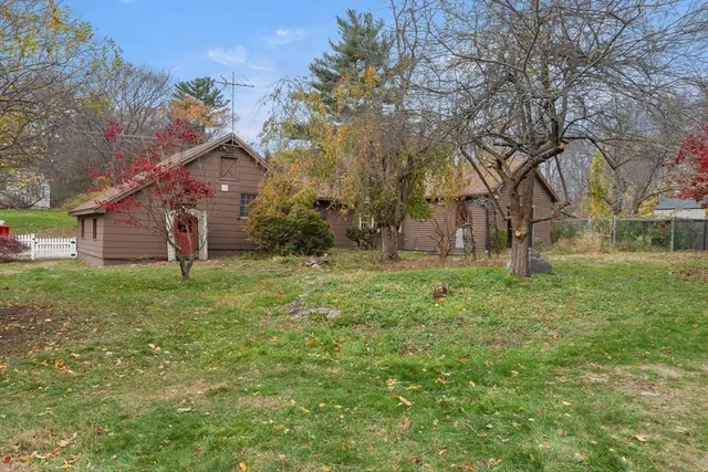 a fire hydrant in the middle of a field