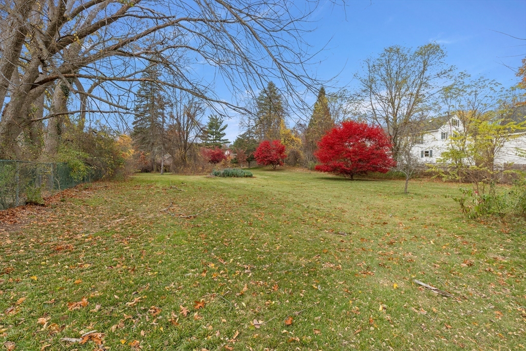 359 Kenoza Street Haverhill, MA 01830 - Photo 4 of 37 a view of a yard with a house