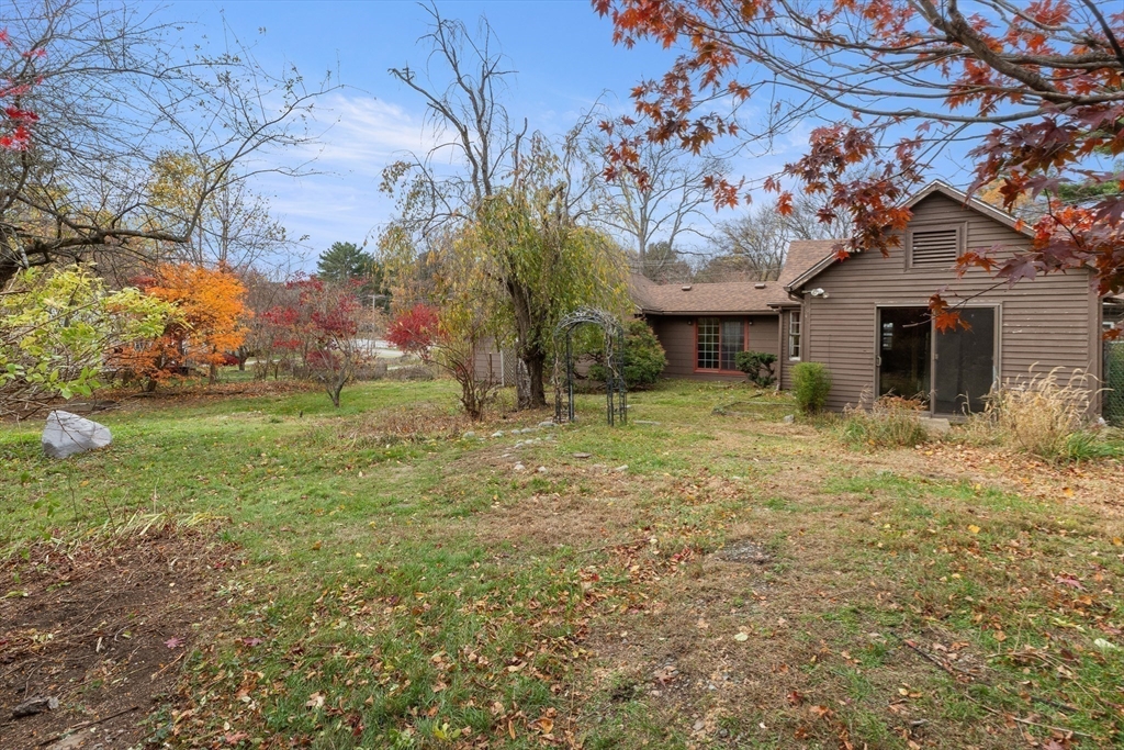 359 Kenoza Street Haverhill, MA 01830 - Photo 7 of 37 a view of a house with a yard