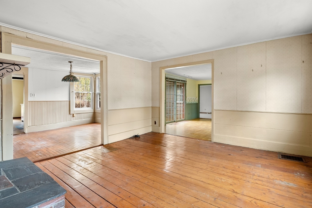 359 Kenoza Street Haverhill, MA 01830 - Photo 10 of 37 a view of a livingroom with wooden floor