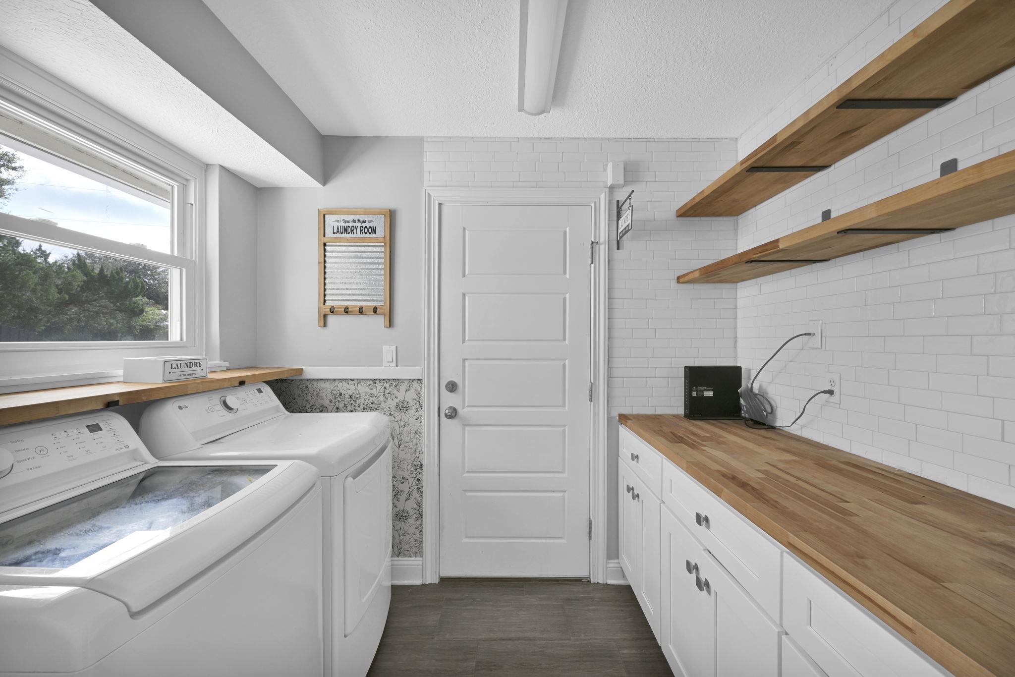 314 Arpieka Avenue St. Augustine, FL 32080 - Photo 13 of 28 a view of a kitchen with white cabinets