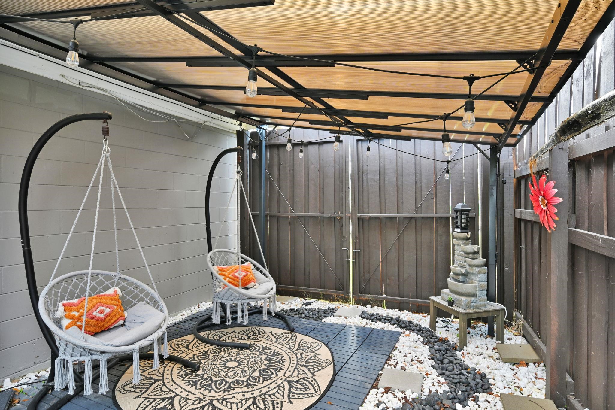 314 Arpieka Avenue St. Augustine, FL 32080 - Photo 22 of 28 a backyard of a house with table and chairs