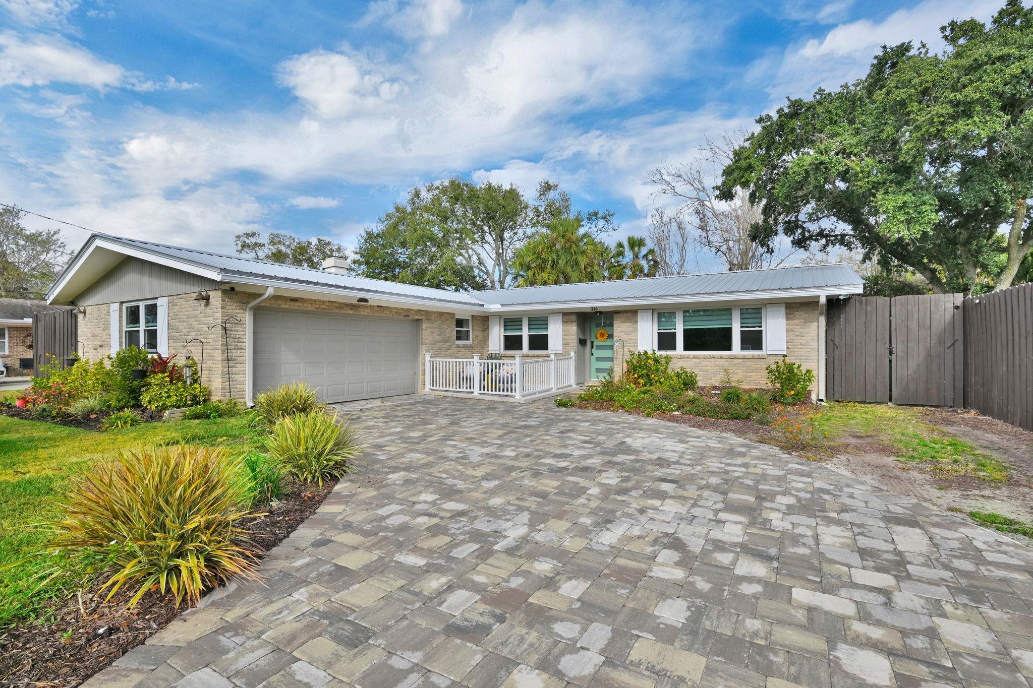 314 Arpieka Avenue St. Augustine, FL 32080 - Photo 4 of 28 front view of house with a yard