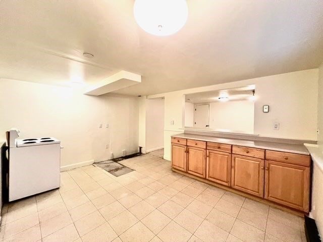 27 Sunset Drive Randolph, MA 02368 - Photo 25 of 37 a spacious bathroom with a sink a mirror and a bathtub