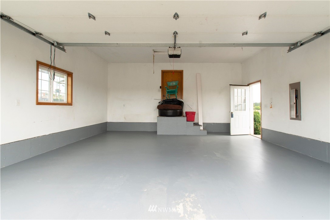 314 Spencer Road Toledo, WA 98591 - Photo 18 of 26 a view of a livingroom with wooden floor and window