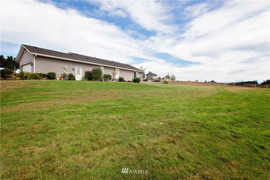314 Spencer Road Toledo, WA 98591 - Photo 20 of 26 a front view of house with yard and trees