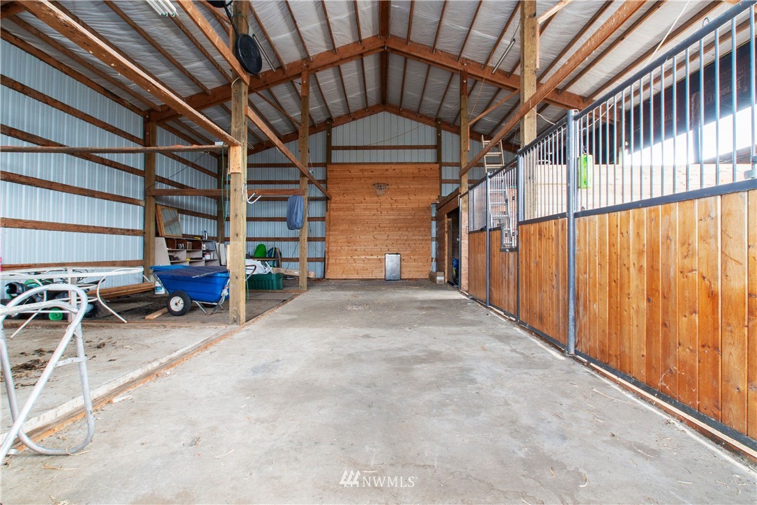 314 Spencer Road Toledo, WA 98591 - Photo 22 of 26 a view of a hallway with wooden fence and some plants