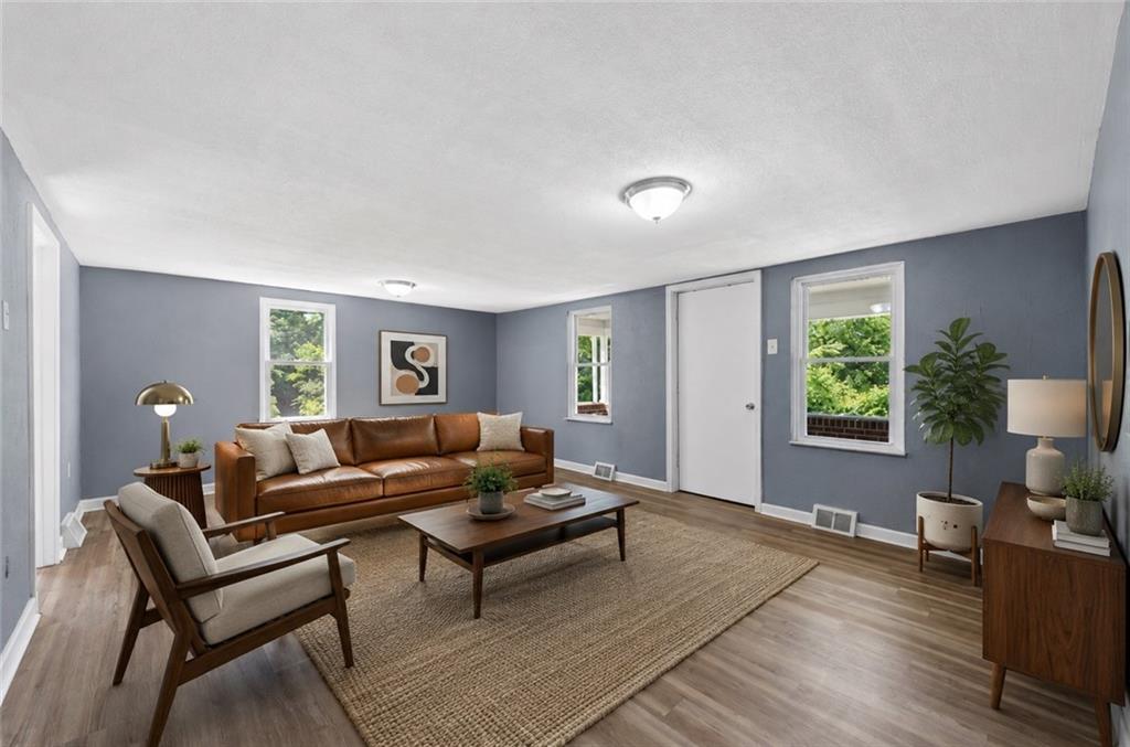 690 Brownstown Road Irwin, PA 15642 - Photo 5 of 24 Living Room *virtually staged*