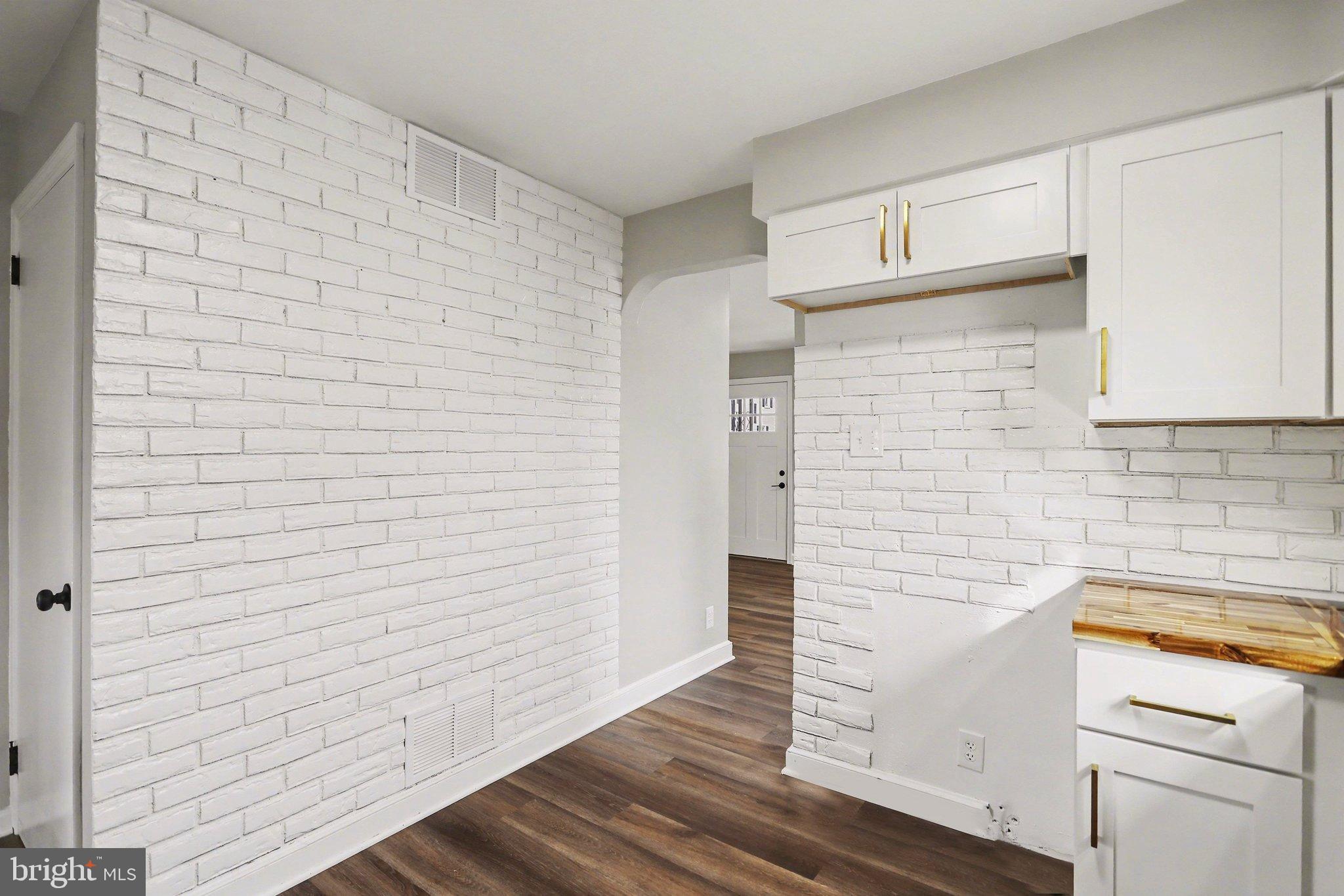 43 West High Street Windsor, PA 17366 - Photo 16 of 46 Chic white brick accents in modern space.